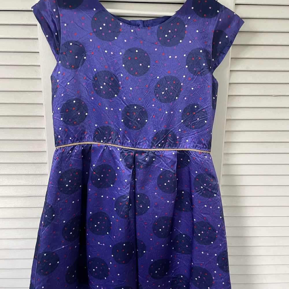Girls fancy dress. Crinkle satin with polka dot pattern. Gold detail